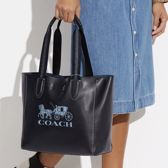 Coach Handbags - Coach Black Tote Bag with Blue Logo